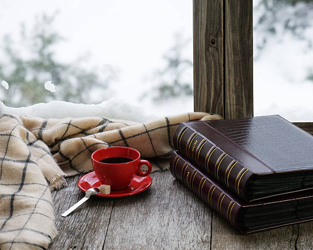 istock Red cup of coffee or tea on stylized wooden windowsill. 508254696