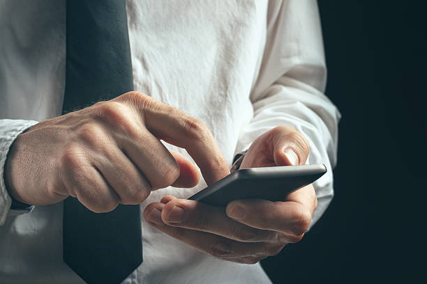 istock Young unrecognizable businessman professional text messaging on 508258628