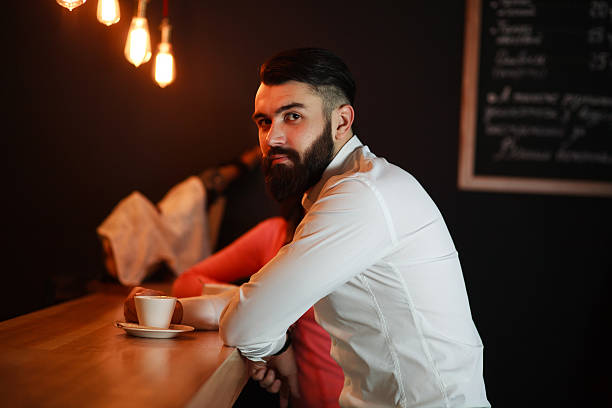 istock Business man behind the bar with coffee 508259218