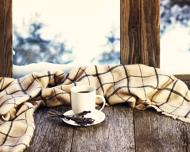 istock White cup of coffee  lavender flowers and woolen plaid. 508261182