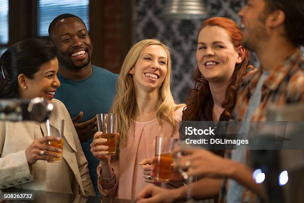 Friends At A Bar Stock Photo - Download Image Now - Adult, Adults Only, After Work