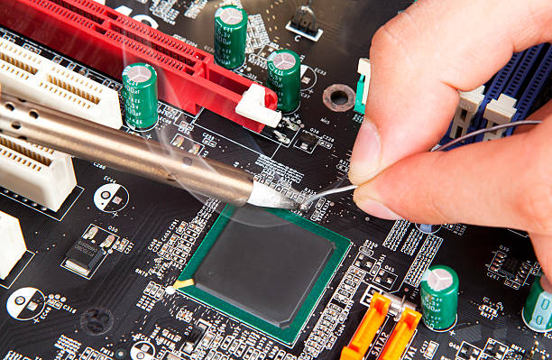 Component soldering Microwelding of electronic components connection block computer cable electronics industry electricity stock pictures, royalty-free photos & images