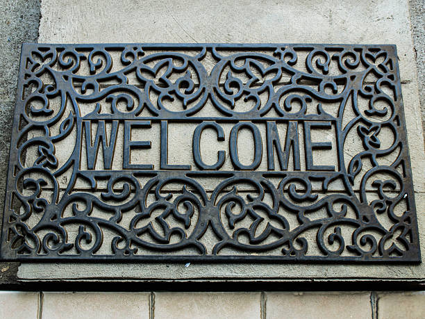 istock Black wrought iron welcome rug in nature 508270693