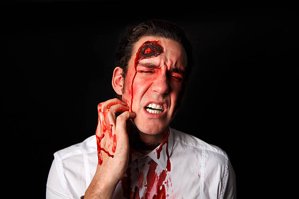 istock Psychopath with bloody scars 508275427