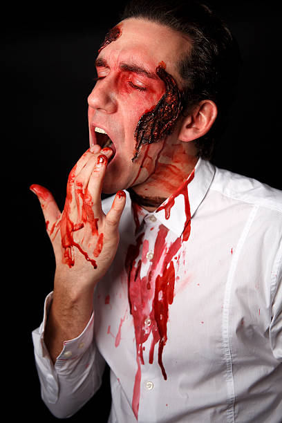 istock Psychopath with bloody fingers 508275551