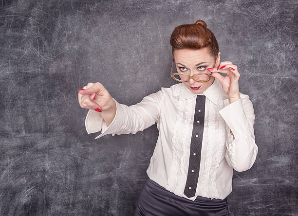 istock Strict teacher showing on someone by finger 508275623