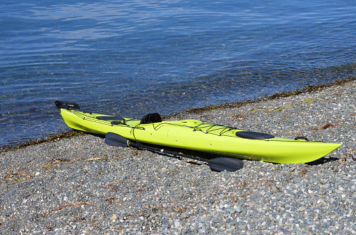 Sea Kayak Beached Just Above The Tideline