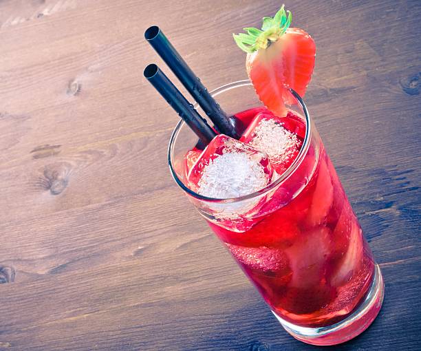 istock strawberry cocktail with ice on old wood table, old style 508286064