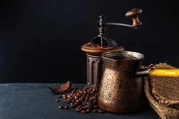 istock Coffee mill and cezve on the dark table horizontal 508286140