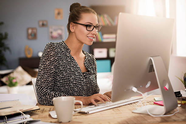 istock Young woman in front of her computer 508288200