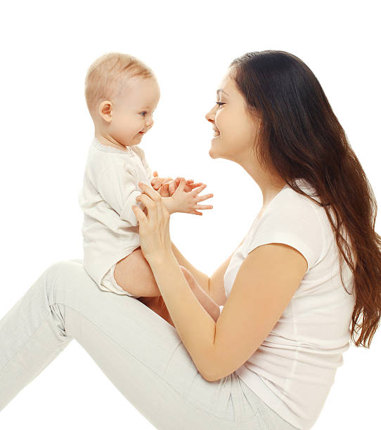 istock Happy smiling mother and baby on a white background 508289100