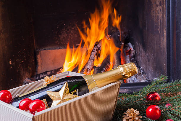 istock christmas presents at fireplace 508289656