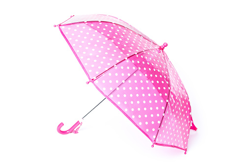 pink umbrella with white dots isolated on white background