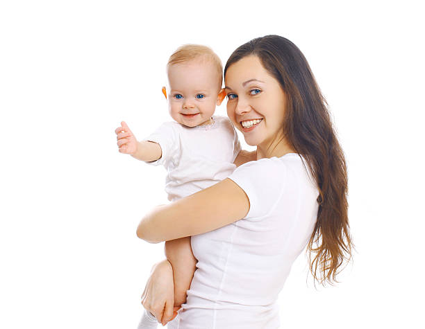 istock Happy smiling mother hugging baby on white background 508291010