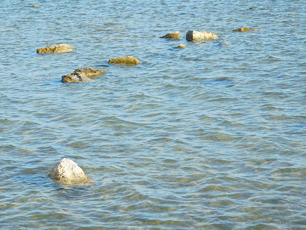 istock stones and rocks to the sea 508292154