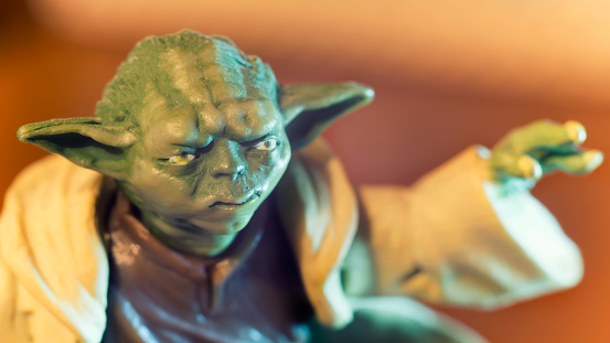 Istanbul, Turkey - January 9, 2016:Close up shot of Jedi Master Yoda, a fictional character in the Star Wars space opera franchise created by George Lucas, first appearing in the 1980 film The Empire Strikes Back.