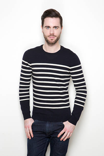 istock Attractive young man in striped sweater 508298519