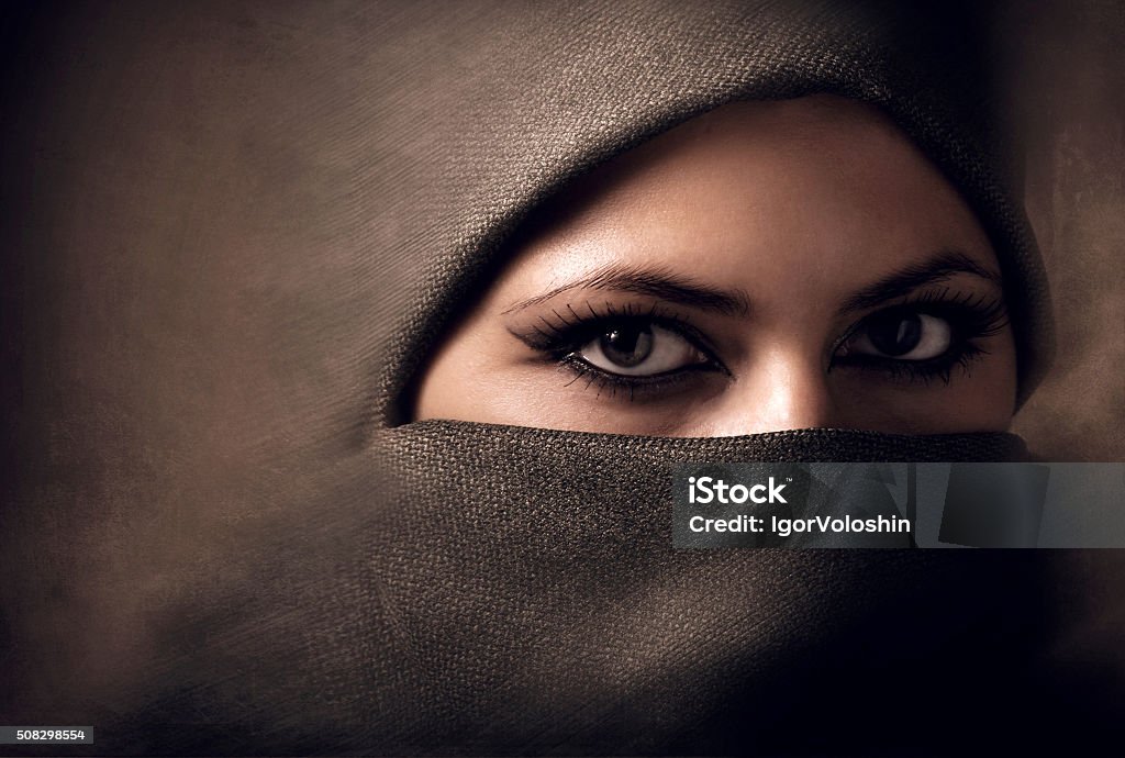 Young arabian woman in hijab. Toning Young arabian woman in hijab. Yashmak. Eye Stock Photo