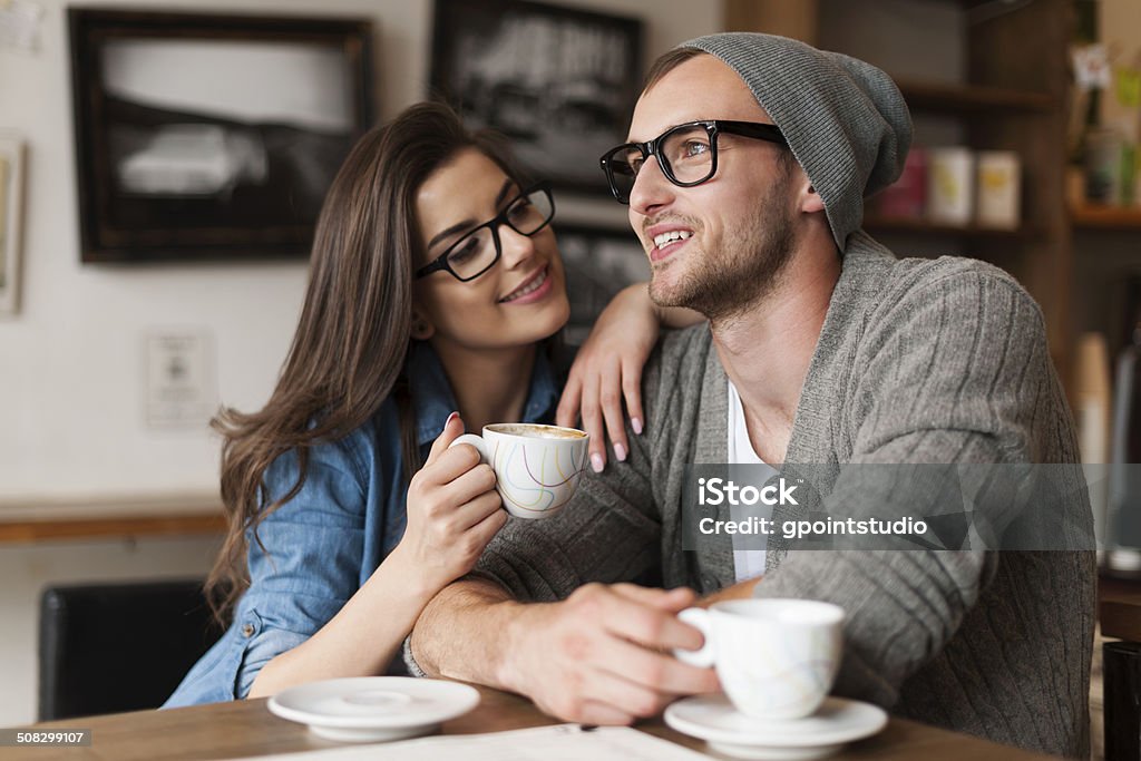 Happy man and woman in cafe Adult Stock Photo