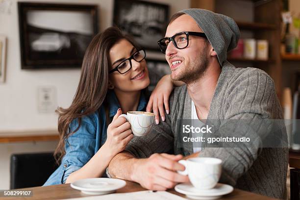 Happy Man And Woman In Cafe Stock Photo - Download Image Now - Adult, Adults Only, Affectionate