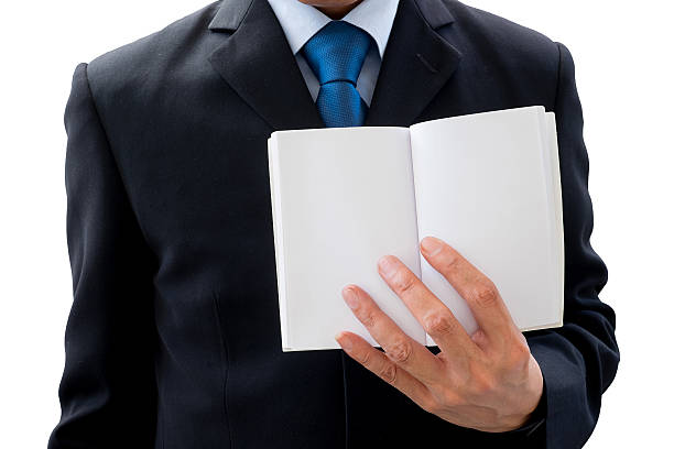 istock Businessman showing blank page of book 508300002
