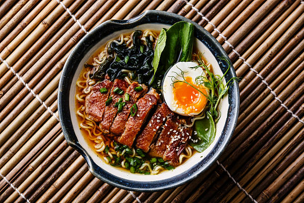 istock Duck noodles with egg and pak choi cabbage in bowl 508300320