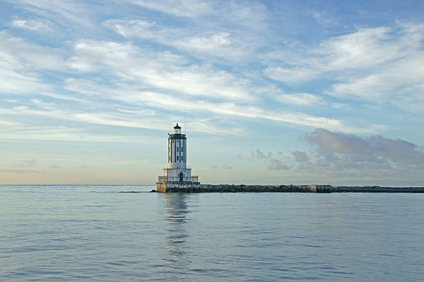 Light house along Southern California coast Light house at Port of Los Angeles on a calm morning lighthouse lighting equipment reflection rock stock pictures, royalty-free photos & images