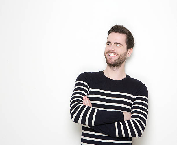 istock Cool guy smiling with arms crossed 508301225
