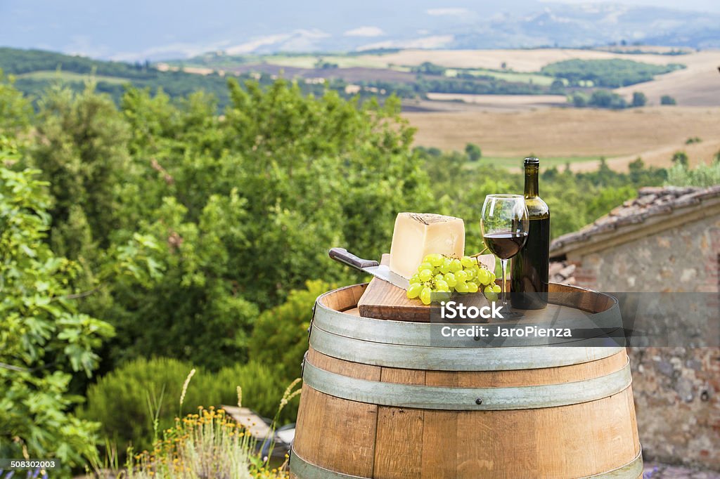 Red wine and grapes with pecorino cheese the Tuscan, Italy Vineyard Stock Photo