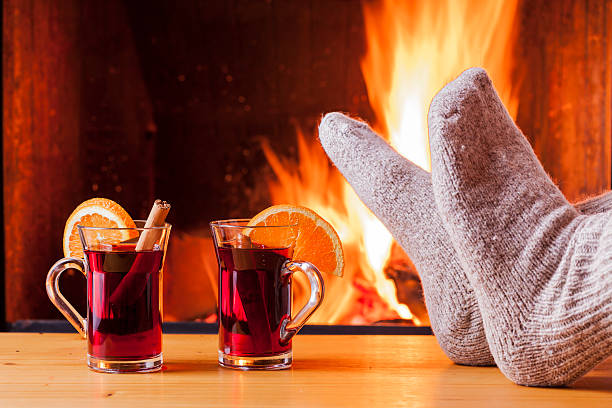 istock relaxing at the fireplace on winter evening 508312168