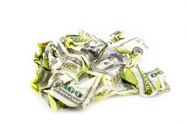 istock Crumpled dollar bill on a white background 508312960