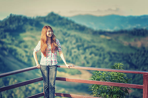 istock Asia beautiful young woman stand on view point 508316270