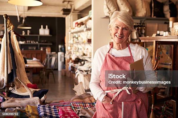 Portrait Of Female Owner Of Gift Store With Digital Tablet Stock Photo - Download Image Now