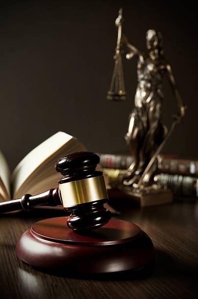 istock Law concept with gavel and themis in background 508318990
