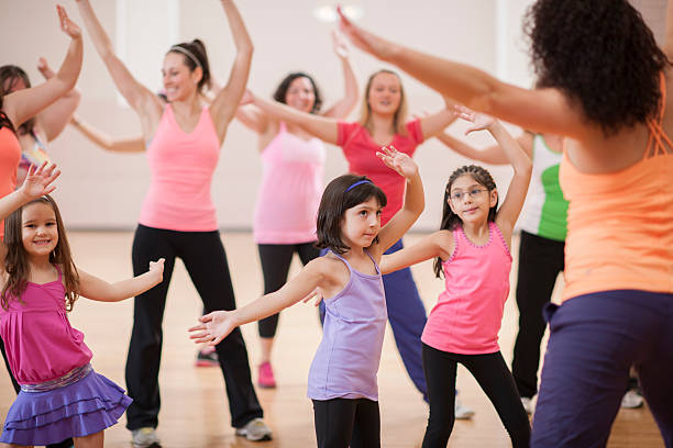 istock Little Girls Taking a Dance Class with Their Mom 508322134