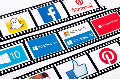 Kiev, Ukraine - August 25, 2015: Film strips logos snapchat, facebook, pinterest, Windows 10 the operating system developed by Microsoft. Films frame Windows 10 logos on the on a white background.