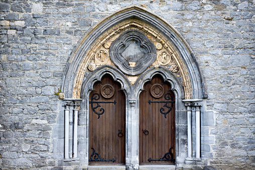 double arched wooden doors in to  St Caniceâs Cathedral kilkenny ireland