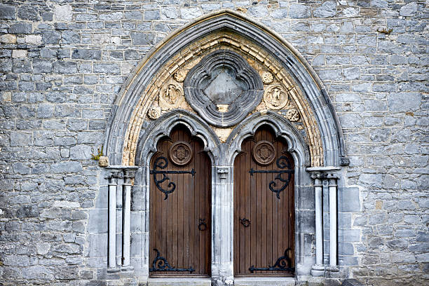 double arched wooden doors stock photo