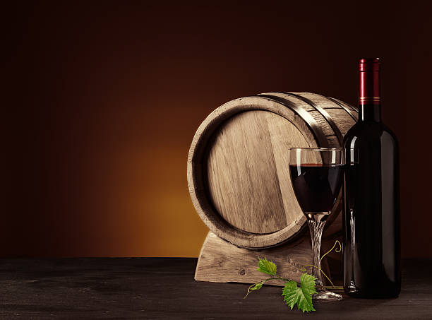 istock bottle, glass and oak barrel 508324170