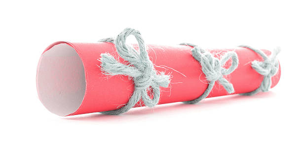 istock Red letter scroll tied with rope, three natural knots isolated 508325978