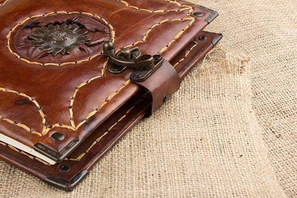 decorative leather cover notebook decorative leather cover notebook diary lock book cover book stock pictures, royalty-free photos & images