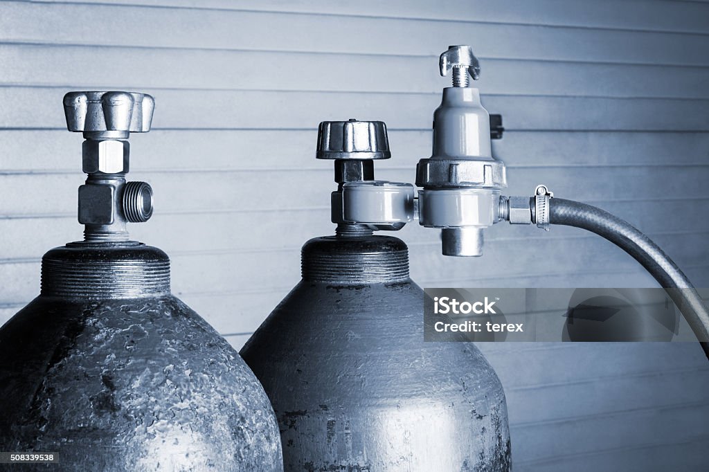 two oxygen cylinders two blue oxygen cylinders close up Natural Gas Stock Photo