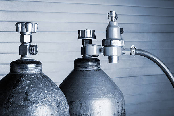 two oxygen cylinders two blue oxygen cylinders close up helium stock pictures, royalty-free photos & images