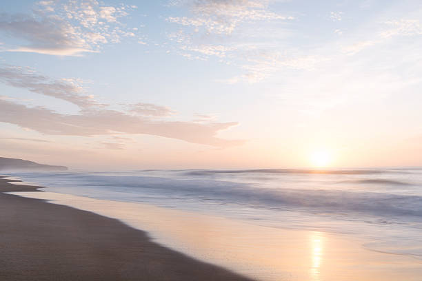 St. Clair Beach in Dunedin, New Zealand sunrise at St. Clair Beach in Dunedin, New Zealand old jetty dunedin stock pictures, royalty-free photos & images