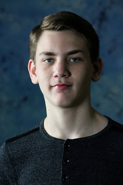 istock Teenager With Blue Eyes Poses For Camera 508342708