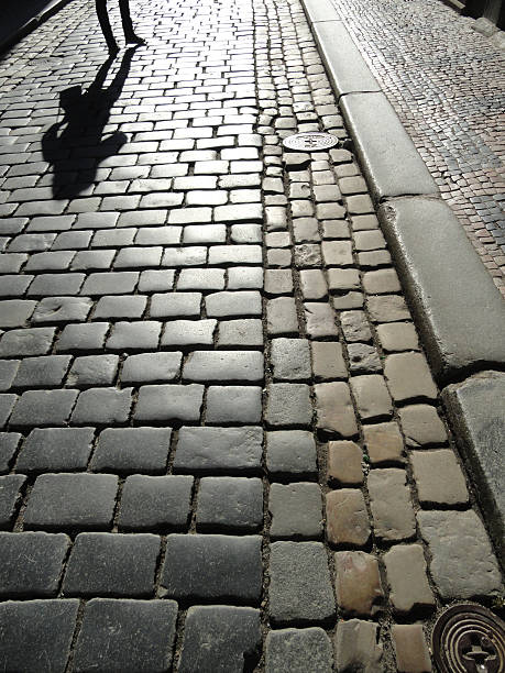 istock Paved Road With A Human Shadow 508346634