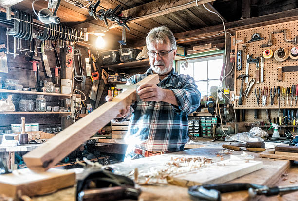 istock Senior craftsman working in traditional workshop 508346776