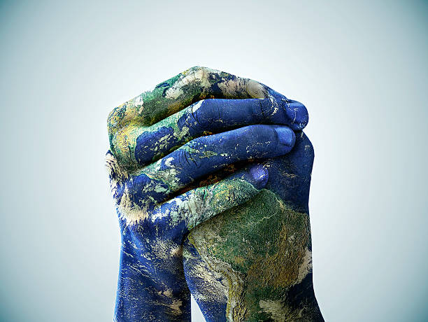 nous sommes le monde - human hand teamwork unity cooperation photos et images de collection