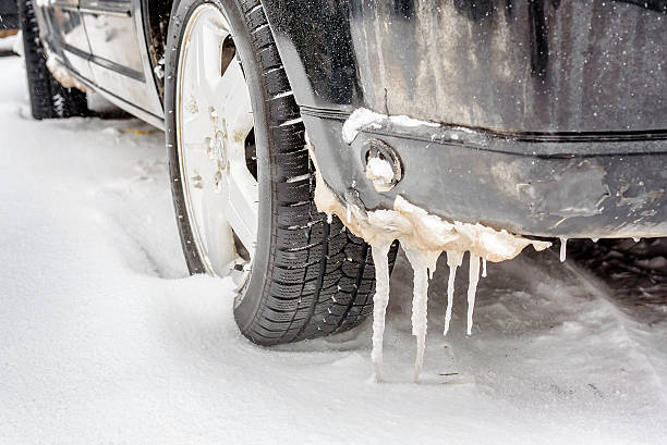 istock Car wheel covered with snow on a winter day 508348056