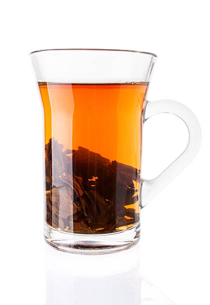 istock Hot Tea with Tea Leaves in Glass Cup 508348615